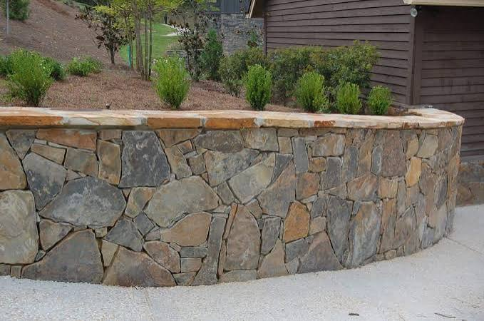 Stone retaining wall design inspiration 4